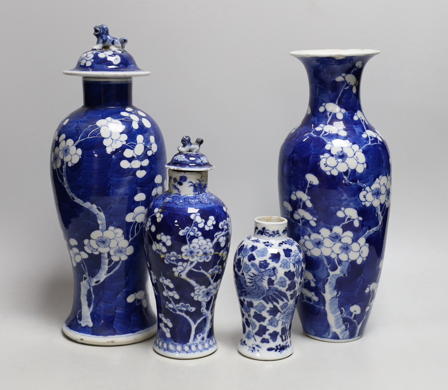 A Chinese prunus baluster jar and cover and three others, similar, tallest 30cms high